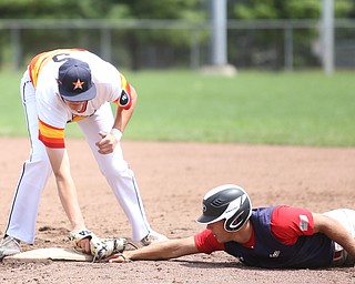 SBA Aces runner Jackson Deemer (35) slides back into first base as Astro Falcons first baseman Joe Rock(5) tags him during the 4th inning as Astro Falcons takes on SBA Aces, Saturday, July 1, 2017 at Bob Cene Park. Astros won 6-0...(Nikos Frazier | The Vindicator).
