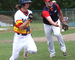 SBA Aces pitcher Nick Benson (30) underhands the ball to the first baseman to out Astro Falcons runner Brendon Myers (12) during the 5th inning as Astro Falcons takes on SBA Aces, Saturday, July 1, 2017 at Bob Cene Park. Astros won 6-0...(Nikos Frazier | The Vindicator).
