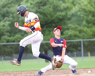 Astro Falcons batter Anthony Michalski(3) collides with SBA Aces second baseman Matt Costello (22) during the 6th inning as Astro Falcons takes on SBA Aces, Saturday, July 1, 2017 at Bob Cene Park. Astros won 6-0...(Nikos Frazier | The Vindicator).