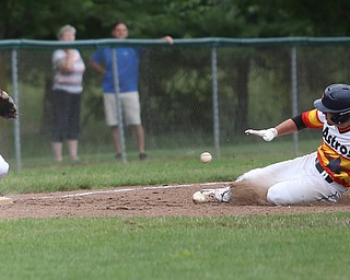 Astro Falcons runner Matt Gibson (24) slides into third as SBA Aces third baseman Sam Wells (21) waits for the pass during the 7th inning as Astro Falcons takes on SBA Aces, Saturday, July 1, 2017 at Bob Cene Park. Astros won 6-0...(Nikos Frazier | The Vindicator).