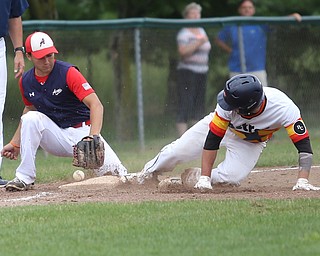 Astro Falcons runner Matt Gibson (24) slides into third as SBA Aces third baseman Sam Wells (21) waits for the pass during the 7th inning as Astro Falcons takes on SBA Aces, Saturday, July 1, 2017 at Bob Cene Park. Astros won 6-0...(Nikos Frazier | The Vindicator).
