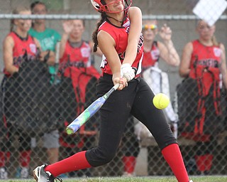 Canfield batter Bayann Jadallah(29) swings during the 1st inning as Canfield takes on Poland in the 12u Little League district title, Monday, July 3, 2017 at Fields of Dreams in Boardman. Poland won 7-6...(Nikos Frazier | The Vindicator)..