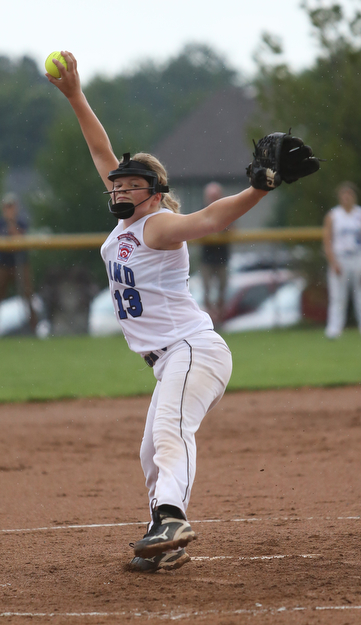 Poland pitcher Alaina Francis(13) pitches during the 2nd inning as Canfield takes on Poland in the 12u Little League district title, Monday, July 3, 2017 at Fields of Dreams in Boardman. Poland won 7-6...(Nikos Frazier | The Vindicator)..