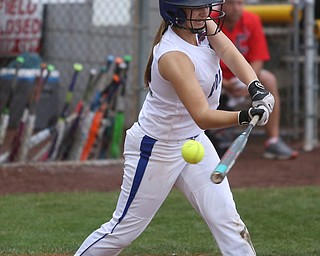 Poland batter Alaina Scavins(40) swings during the 2nd inning as Canfield takes on Poland in the 12u Little League district title, Monday, July 3, 2017 at Fields of Dreams in Boardman. Poland won 7-6...(Nikos Frazier | The Vindicator)..
