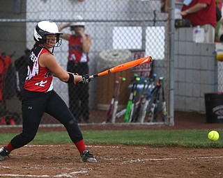 Canfield batter Gianna Snyder(22) swings during the 3rd inning as Canfield takes on Poland in the 12u Little League district title, Monday, July 3, 2017 at Fields of Dreams in Boardman. Poland won 7-6...(Nikos Frazier | The Vindicator)..