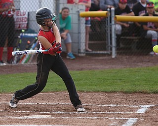 Canfield batter Layni Bednar(9) swings during the 4th inning as Canfield takes on Poland in the 12u Little League district title, Monday, July 3, 2017 at Fields of Dreams in Boardman. Poland won 7-6...(Nikos Frazier | The Vindicator)..