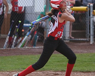 Canfield batter Bayann Jadallah(29) looks up at her hit during the 4th inning as Canfield takes on Poland in the 12u Little League district title, Monday, July 3, 2017 at Fields of Dreams in Boardman. Poland won 7-6...(Nikos Frazier | The Vindicator)..