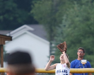 Poland outfielder Alaina Scavina(40) looks up for the catch during the 4th inning as Canfield takes on Poland in the 12u Little League district title, Monday, July 3, 2017 at Fields of Dreams in Boardman. Poland won 7-6...(Nikos Frazier | The Vindicator)..