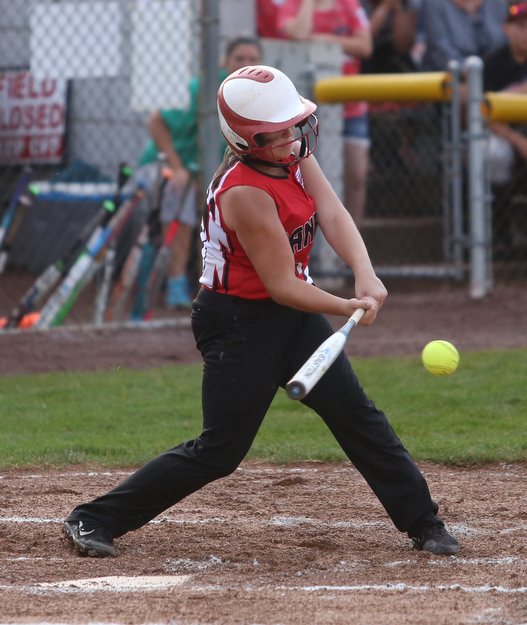 Canfield batter Bridgett Kelly(00) swings during the 4th inning as Canfield takes on Poland in the 12u Little League district title, Monday, July 3, 2017 at Fields of Dreams in Boardman. Poland won 7-6...(Nikos Frazier | The Vindicator)..