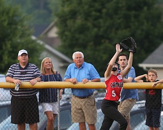 Canfield outfielder Kate Grdic(5) runs for the catch during the 4th inning as Canfield takes on Poland in the 12u Little League district title, Monday, July 3, 2017 at Fields of Dreams in Boardman. Poland won 7-6...(Nikos Frazier | The Vindicator)..