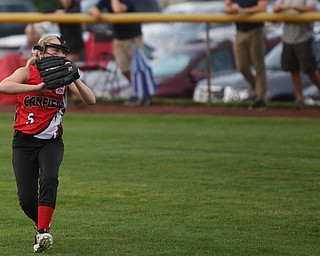 Canfield outfielder Kate Grdic(5) misses the catch during the 4th inning as Canfield takes on Poland in the 12u Little League district title, Monday, July 3, 2017 at Fields of Dreams in Boardman. Poland won 7-6...(Nikos Frazier | The Vindicator)..