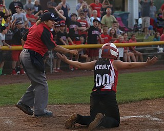 Canfield runner Bridgett Kelly(00) is called out by the home plate umpire after being tagged out by Poland catcher Emily Denney(10) during the 6th inning as Canfield takes on Poland in the 12u Little League district title, Monday, July 3, 2017 at Fields of Dreams in Boardman. Poland won 7-6...(Nikos Frazier | The Vindicator)..