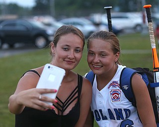 Marissa Trevis(left) takes a selfie with sister Meredith Trevis(6) after Poland beat Canfield, 7-6 in the 12u Little League district title, Monday, July 3, 2017 at Fields of Dreams in Boardman...(Nikos Frazier | The Vindicator)..