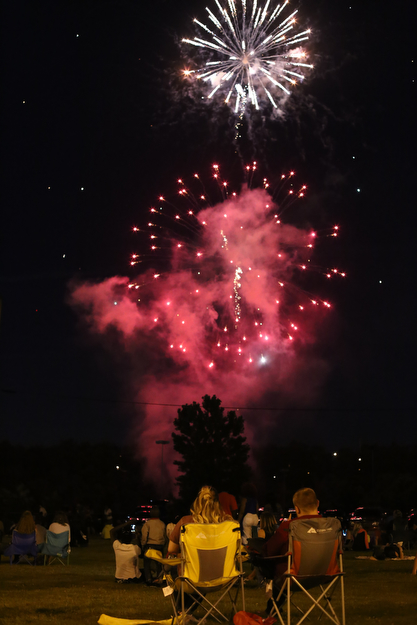 Zach Eichelbergen(right) and girlfriend Paula Nakley watch the Fourth of July Fireworks at the Covelli Centre, Tuesday, July 4, 2017 in Youngstown...(Nikos Frazier | The Vindicator)