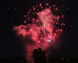 Zach Eichelbergen(right) and girlfriend Paula Nakley watch the Fourth of July Fireworks at the Covelli Centre, Tuesday, July 4, 2017 in Youngstown...(Nikos Frazier | The Vindicator)