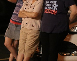 Tomao Ohl(10), grandmom Mary Cupples of Austintown and Adda Cupples(15) during the Fourth of July Fireworks at the Covelli Centre, Tuesday, July 4, 2017 in Youngstown...(Nikos Frazier | The Vindicator)