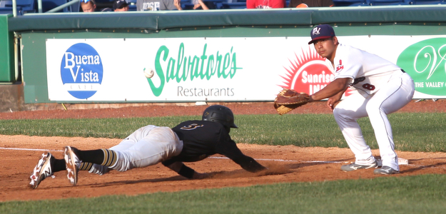Mahoning Valley Scrappers first baseman Ulysses Cantu (8) leans down for the ball as West Virginia Black Bears short stop Brett Pope (3) slides back into first in the third inning against the Mahoning Valley Scrappers/West Virginia Black Bears, Wednesday, July 5, 2017, at Eastwood Field in Niles. ..(Nikos Frazier | The Vindicator)..