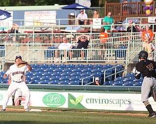 Mahoning Valley Scrappers first baseman Ulysses Cantu (8) waits for the ball from Mahoning Valley Scrappers pitcher Zach Plesac (22) to out West Virginia Black Bears third baseman Dylan Busby (18) in the fourth inning against the Mahoning Valley Scrappers/West Virginia Black Bears, Wednesday, July 5, 2017, at Eastwood Field in Niles. ..(Nikos Frazier | The Vindicator)..