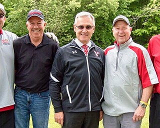 Winners of YSU Honors College Scramble:  Andy Hrusovsky, Fred Gintert, Tom Shuster, Nick Francos featured with YSU President Jim Tressel.

