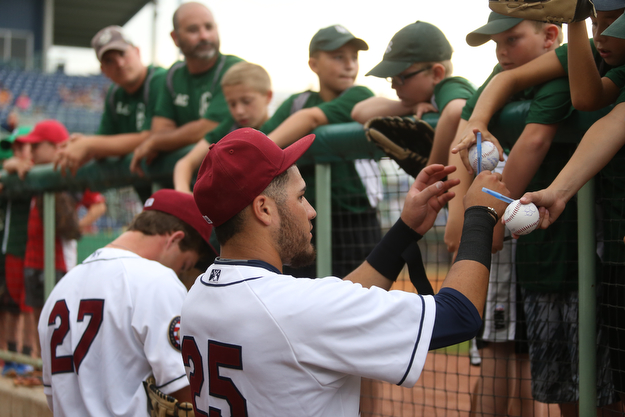 Mahoning Valley Scrappers third baseman Jonathan Laureano (25) autographs baseballs before the Mahoning Valley Scrappers take on the West Virginia Black Bears, Thursday, July 6, 2017, at Eastwood Field in Niles. ..(Nikos Frazier | The Vindicator)..