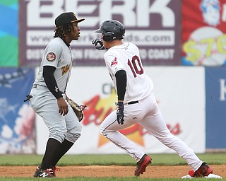 Mahoning Valley Scrappers third baseman Nolan Jones (10) rounds second past West Virginia Black Bears second baseman Gift Ngoepe (29) before sliding into third in the first inning as the Mahoning Valley Scrappers take on the West Virginia Black Bears, Thursday, July 6, 2017, at Eastwood Field in Niles. ..(Nikos Frazier | The Vindicator)..