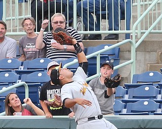 West Virginia Black Bears catcher Jose Barraza (23) gets the catch to out Mahoning Valley Scrappers right fielder Will Benson (7) in the second inning as the Mahoning Valley Scrappers take on the West Virginia Black Bears, Thursday, July 6, 2017, at Eastwood Field in Niles. ..(Nikos Frazier | The Vindicator)..