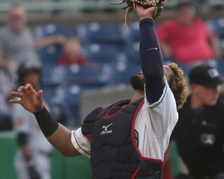 Mahoning Valley Scrappers catcher Jason Rodriguez (20) with the catch to out West Virginia Black Bears third baseman Julio De La Cruz (10) in the third inning as the Mahoning Valley Scrappers take on the West Virginia Black Bears, Thursday, July 6, 2017, at Eastwood Field in Niles. ..(Nikos Frazier | The Vindicator)..