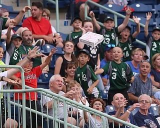 A pizza box flies into the crowd in the fourth inning as the Mahoning Valley Scrappers take on the West Virginia Black Bears, Thursday, July 6, 2017, at Eastwood Field in Niles. ..(Nikos Frazier | The Vindicator)..