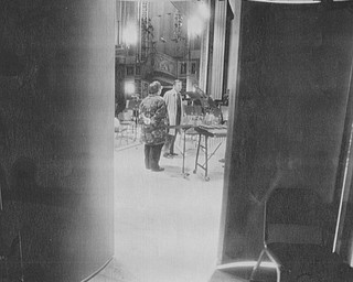 (Feb 27, 1995) John Kenley talks with leslie brown, theater administrator at powers auditorium, on the stage of the theater during a tour of the facility after a press conference Monday. Kenley is talking about bringing some shows to the area if enough interest is there....(Bruce Palmer | The Vindicator File Photo)