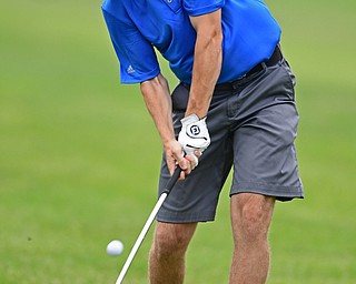 SALEM, OHIO - JULY 6, 2017: John Papa of South Range follows through on his approach shot on the 10th hole during the Vindy Greatest Golfer qualifying round at Salem Hills Golf Course, Thursday afternoon. DAVID DERMER | THE VINDICATOR
