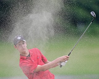SALEM, OHIO - JULY 6, 2017: Dante Flak of Canfield chips out of the bunker on the 16th hole during the Vindy Greatest Golfer qualifying round at Salem Hills Golf Course, Thursday afternoon. DAVID DERMER | THE VINDICATOR