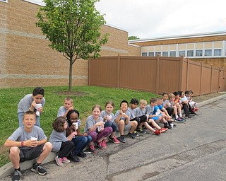 Neighbors | Alexis Bartolomucci.Doreen Miner's fourth-grade class enjoyed snowcones outside during their fun day on May 26 at Robinwood Lane Elementary.