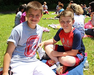 Neighbors | Abby Slanker.On June 2, two Hilltop Elementary School fourth-grade students were all smiles as they celebrated the end of their time at the school with a Fourth Grade Picnic.