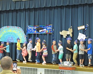 Neighbors | Alexis Bartolomucci.Students in Joy Bucci's class put on a performance for their families during their graduation ceremony on May 25.