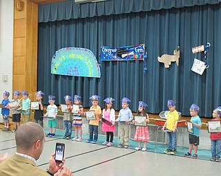 Neighbors | Alexis Bartolomucci.Joy Bucci's Poland North Preschool students held up their preschool diplomas after their graduation.
