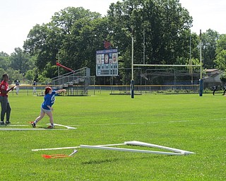 Neighbors | Alexis Bartolomucci.Athletes participated in a mini javelin throwing contest on June 10 at Austintown Fitch High School during the Special Olympics event.