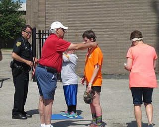 Neighbors | Alexis Bartolomucci.Athletes were given medals and other awards for their participation in the Special Olympics events at Austintown Fitch on June 10.