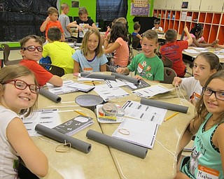 Neighbors | Alexis Bartolomucci.Students at Camp Intervention worked on making rockets that they were going to launch for the Camp Invention program at Austintown Intermediate School.