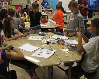Neighbors | Alexis Bartolomucci.Camp Invention students at Austintown created rockets they would launch on June 19 at Austintown Intermediate School.