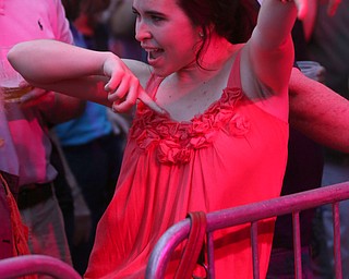 Maddie Leek of Poland dances to "Secret Agent Man" as The Fabulous Flashbacks perform in Central Square, Friday, July 7, 2017 in downtown Youngstown...(Nikos Frazier | The Vindicator)