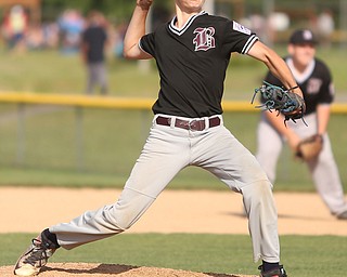 Boardman pitcher Justin Jones (00) throws in the first inning as Boardman takes on Poland, Friday, July 7, 2017, at Fields of Dreams in Boardman. Poland won 12-7...(Nikos Frazier | The Vindicator)..