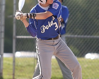 Poland short stop Anthony Perry (3) swings in the first inning as Boardman takes on Poland, Friday, July 7, 2017, at Fields of Dreams in Boardman. Poland won 12-7...(Nikos Frazier | The Vindicator)..