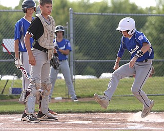Poland short stop Anthony Perry (3) scores a run in the second inning as Boardman takes on Poland, Friday, July 7, 2017, at Fields of Dreams in Boardman. Poland won 12-7...(Nikos Frazier | The Vindicator)..
