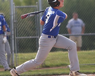 Poland first baseman Anthony Koulianos (9) swings in the second inning as Boardman takes on Poland, Friday, July 7, 2017, at Fields of Dreams in Boardman. Poland won 12-7...(Nikos Frazier | The Vindicator)..