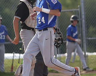 Poland right fielder Anthony Patellis (24) scores a run in the second inning as Boardman takes on Poland, Friday, July 7, 2017, at Fields of Dreams in Boardman. Poland won 12-7...(Nikos Frazier | The Vindicator)..
