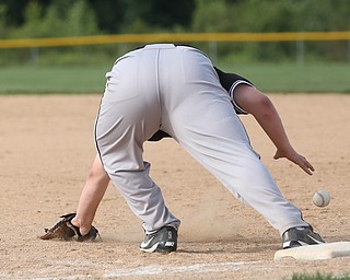 Boardman first baseman David Cross (72) misses a ground ball in the second inning to allow Poland pitcher Mason Planey (11) to run to second as Boardman takes on Poland, Friday, July 7, 2017, at Fields of Dreams in Boardman. Poland won 12-7...(Nikos Frazier | The Vindicator)..