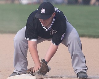 Boardman first baseman David Cross (72) misses another ground ball in the second inning as Boardman takes on Poland, Friday, July 7, 2017, at Fields of Dreams in Boardman. Poland won 12-7...(Nikos Frazier | The Vindicator)..