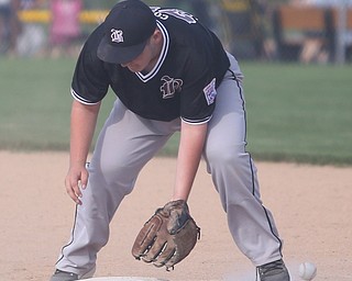 Boardman first baseman David Cross (72) misses another ground ball in the second inning as Boardman takes on Poland, Friday, July 7, 2017, at Fields of Dreams in Boardman. Poland won 12-7...(Nikos Frazier | The Vindicator)..