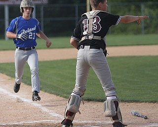Boardman catcher Frank Bard (13) calls out for the ball as Poland center fielder Jacob Caudle (23) runs towards home to score in the second inning as Boardman takes on Poland, Friday, July 7, 2017, at Fields of Dreams in Boardman. Poland won 12-7...(Nikos Frazier | The Vindicator)..
