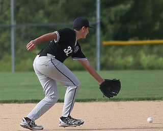 Boardman third baseman Anthony Micco (33) misses the catch in the second inning as Boardman takes on Poland, Friday, July 7, 2017, at Fields of Dreams in Boardman. Poland won 12-7...(Nikos Frazier | The Vindicator)..